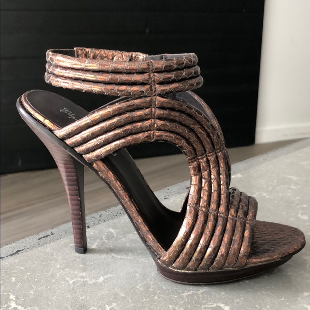 Elizabeth and James gold heels